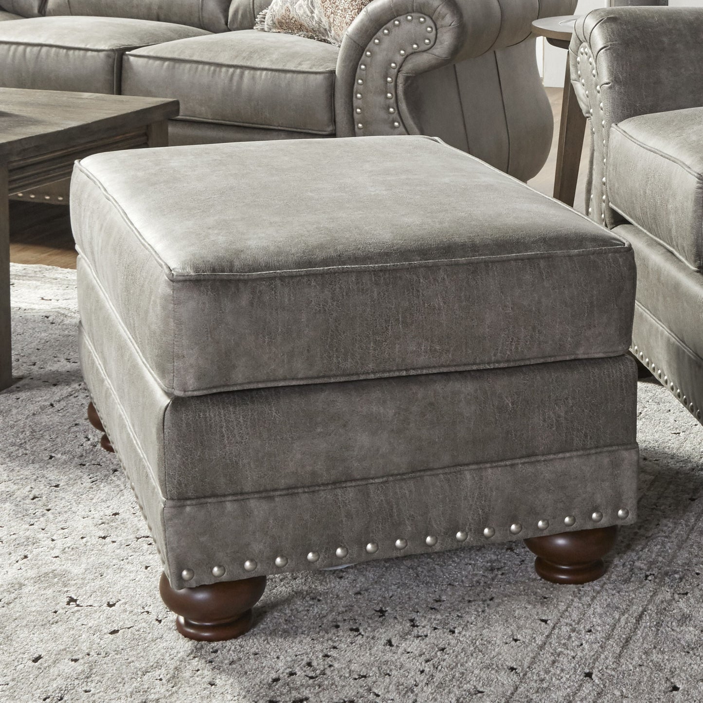 Leinster Faux Leather Upholstered Nailhead Ottoman in Stone Gray